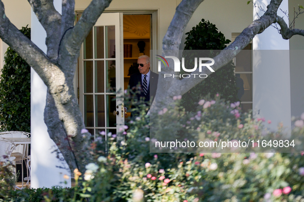 U.S. President Joe Biden exits the White House to board Marine One en route to Milwaukee, Wisconsin and Philadelphia, Pennsylvania on Octobe...