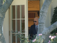 US President Joe Biden walks on the South Lawn of the White House before boarding Marine One in Washington, DC, US, on Tuesday, Oct. 8, 2024...