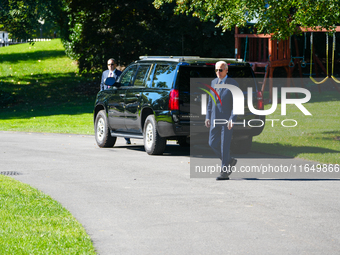 US President Joe Biden walks on the South Lawn of the White House before boarding Marine One in Washington, DC, US, on Tuesday, Oct. 8, 2024...