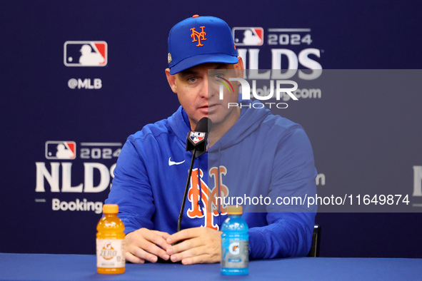 New York Mets manager Carlos Mendoza #64 speaks to the media during a press conference before the baseball game against the Philadelphia Phi...