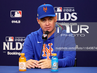 New York Mets manager Carlos Mendoza #64 speaks to the media during a press conference before the baseball game against the Philadelphia Phi...