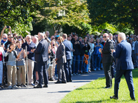 US President Joe Biden walks on the South Lawn of the White House before boarding Marine One in Washington, DC, US, on Tuesday, Oct. 8, 2024...