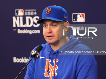 New York Mets manager Carlos Mendoza #64 speaks to the media during a press conference before the baseball game against the Philadelphia Phi...