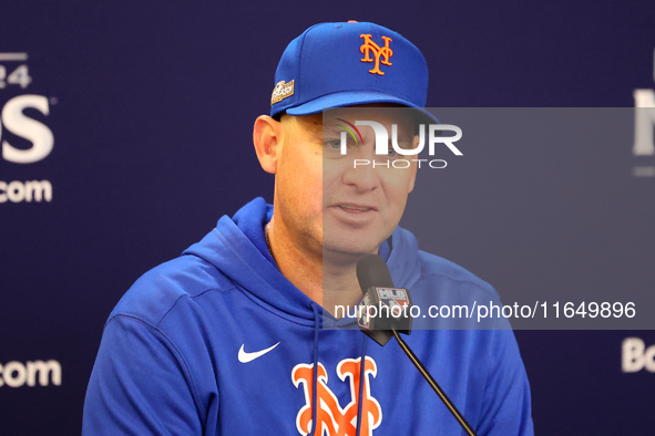 New York Mets manager Carlos Mendoza #64 speaks to the media during a press conference before the baseball game against the Philadelphia Phi...