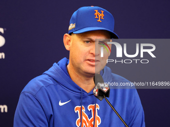 New York Mets manager Carlos Mendoza #64 speaks to the media during a press conference before the baseball game against the Philadelphia Phi...