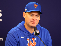 New York Mets manager Carlos Mendoza #64 speaks to the media during a press conference before the baseball game against the Philadelphia Phi...