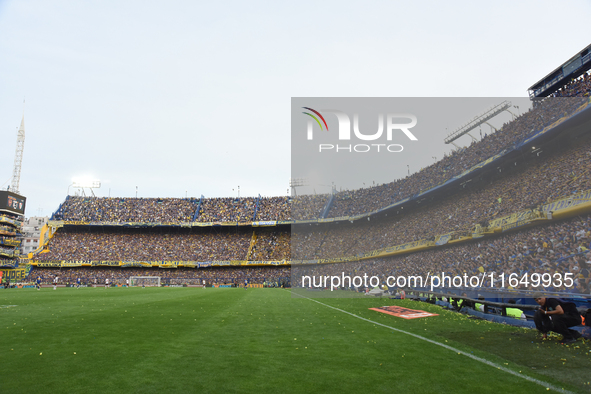 Fans of Boca Juniors cheer for their team before a Liga Profesional match between Boca Juniors and River Plate at Alberto J. Armando Stadium...