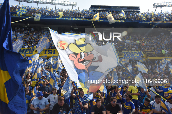 Fans of Boca Juniors cheer for their team before a Liga Profesional match between Boca Juniors and River Plate at Alberto J. Armando Stadium...