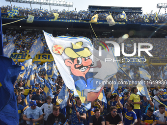 Fans of Boca Juniors cheer for their team before a Liga Profesional match between Boca Juniors and River Plate at Alberto J. Armando Stadium...