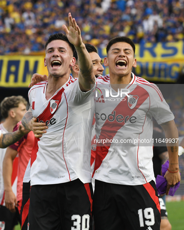 Franco Mastantuono and Claudio Etcheverry of River Plate celebrate their team's victory in a Liga Profesional match between Boca Juniors and...