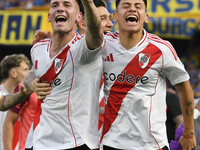 Franco Mastantuono and Claudio Etcheverry of River Plate celebrate their team's victory in a Liga Profesional match between Boca Juniors and...