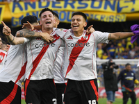 Franco Mastantuono and Claudio Etcheverry of River Plate celebrate their team's victory in a Liga Profesional match between Boca Juniors and...