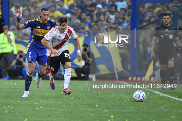 Marcos Acuna of River Plate and Cristian Lema of Boca Juniors participate in a Liga Profesional match between Boca Juniors and River Plate a...