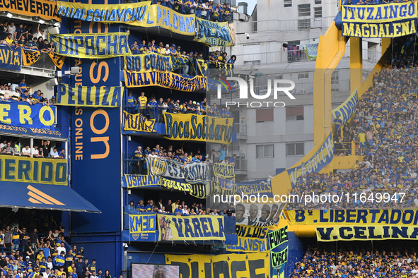 Fans of Boca Juniors cheer for their team before a Liga Profesional match between Boca Juniors and River Plate at Alberto J. Armando Stadium...