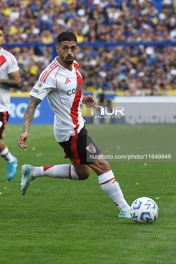 Manuel Lanzini of River Plate participates in a Liga Profesional match between Boca Juniors and River Plate at Alberto J. Armando Stadium in...