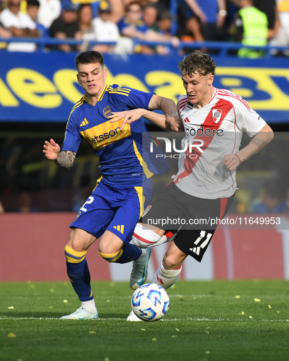 Kevin Zenon of Boca Juniors and Facundo Colidio of River Plate play during a Liga Profesional match between Boca Juniors and River Plate at...