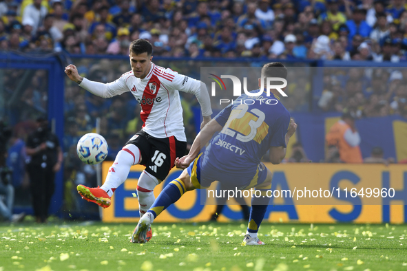 Fabricio Bustos of River Plate and Lautaro Blanco of Boca Juniors play during a Liga Profesional match between Boca Juniors and River Plate...