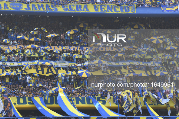 Fans of Boca Juniors cheer for their team before a Liga Profesional match between Boca Juniors and River Plate at Alberto J. Armando Stadium...