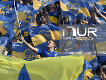 Fans of Boca Juniors cheer for their team before a Liga Profesional match between Boca Juniors and River Plate at Alberto J. Armando Stadium...