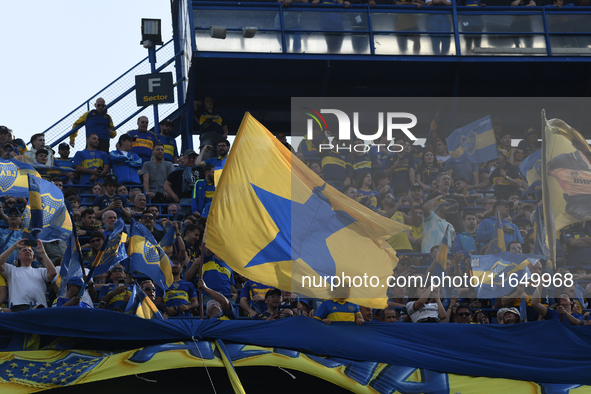 Fans of Boca Juniors cheer for their team before a Liga Profesional match between Boca Juniors and River Plate at Alberto J. Armando Stadium...