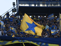 Fans of Boca Juniors cheer for their team before a Liga Profesional match between Boca Juniors and River Plate at Alberto J. Armando Stadium...