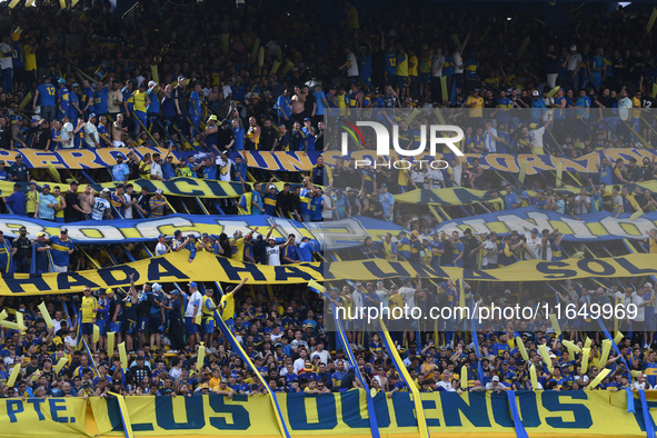 Fans of Boca Juniors cheer for their team before a Liga Profesional match between Boca Juniors and River Plate at Alberto J. Armando Stadium...