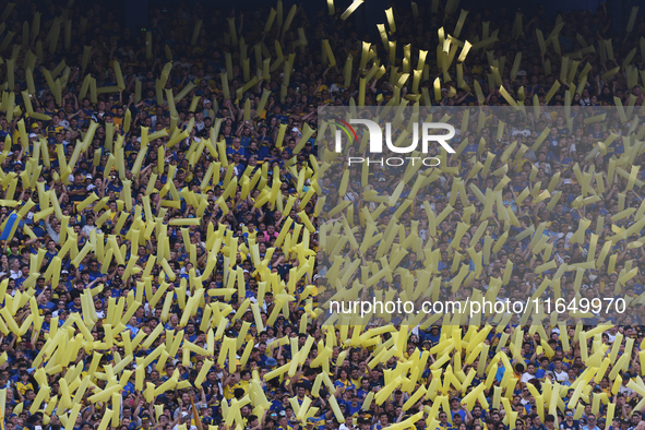 Fans of Boca Juniors cheer for their team before a Liga Profesional match between Boca Juniors and River Plate at Alberto J. Armando Stadium...