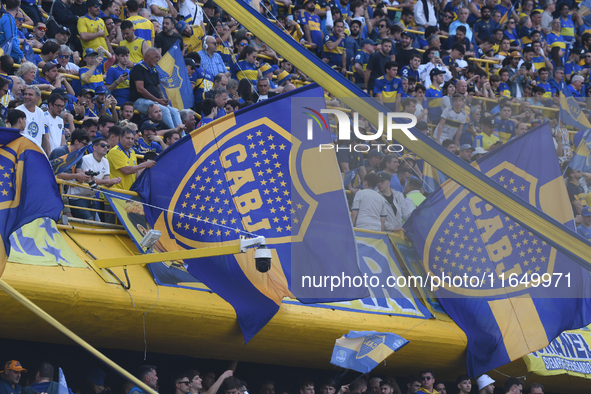 Fans of Boca Juniors cheer for their team before a Liga Profesional match between Boca Juniors and River Plate at Alberto J. Armando Stadium...