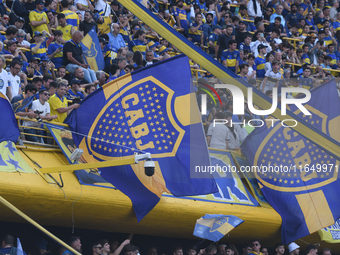 Fans of Boca Juniors cheer for their team before a Liga Profesional match between Boca Juniors and River Plate at Alberto J. Armando Stadium...