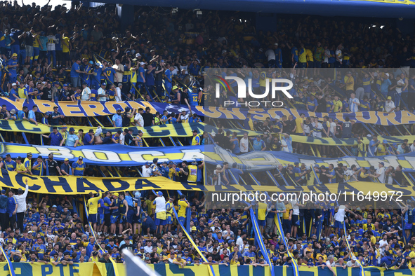 Fans of Boca Juniors cheer for their team before a Liga Profesional match between Boca Juniors and River Plate at Alberto J. Armando Stadium...