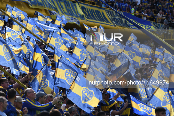 Fans of Boca Juniors cheer for their team before a Liga Profesional match between Boca Juniors and River Plate at Alberto J. Armando Stadium...