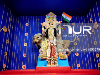 Devotees worship a Durga idol as a form of ''Bharat Mata'' inside a pandal or a temporary platform in Kolkata, India, on October 8, 2024, du...