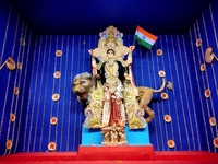 Devotees worship a Durga idol as a form of ''Bharat Mata'' inside a pandal or a temporary platform in Kolkata, India, on October 8, 2024, du...