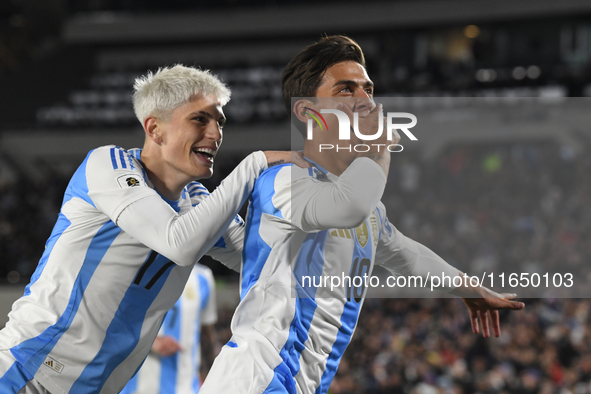 Paulo Dybala and Alejandro Garnacho of Argentina celebrate their team's goal during a match between Argentina and Chile at Estadio Mas Monum...