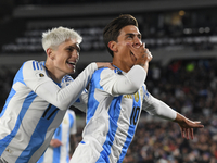 Paulo Dybala and Alejandro Garnacho of Argentina celebrate their team's goal during a match between Argentina and Chile at Estadio Mas Monum...