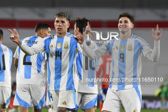 Julian Alvarez and Enzo Fernandez of Argentina celebrate their team's goal during a match between Argentina and Chile at Estadio Mas Monumen...