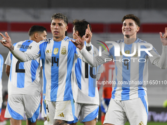 Julian Alvarez and Enzo Fernandez of Argentina celebrate their team's goal during a match between Argentina and Chile at Estadio Mas Monumen...