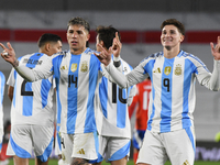 Julian Alvarez and Enzo Fernandez of Argentina celebrate their team's goal during a match between Argentina and Chile at Estadio Mas Monumen...