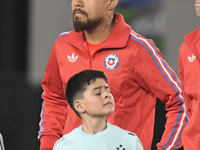 Paulo Diaz of Chile stands during the national anthems ceremony before a match between Argentina and Chile at Estadio Mas Monumental Antonio...