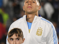 Enzo Fernandez participates in the national anthems ceremony before a match between Argentina and Chile at Estadio Mas Monumental Antonio Ve...