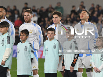 In Buenos Aires, Argentina, on September 5, Alexis Mac Allister, Julian Alvarez, and Enzo Fernandez of Argentina participate in the national...