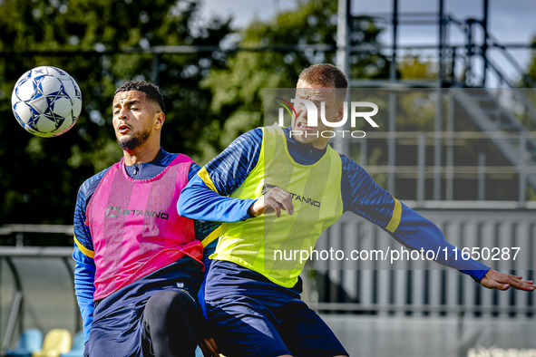 RKC player Mohamed Ihattaren and RKC player Dario van de Buijs train at the Mandemakers Stadium for the Dutch Eredivisie season 2024-2025 in...