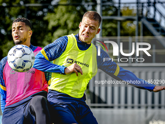 RKC player Mohamed Ihattaren and RKC player Dario van de Buijs train at the Mandemakers Stadium for the Dutch Eredivisie season 2024-2025 in...