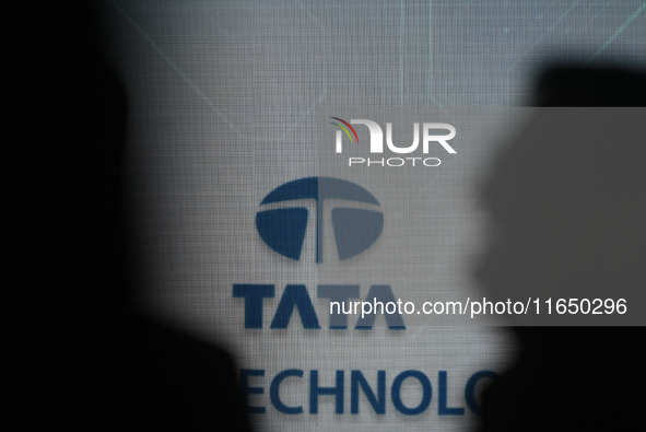 A Tata logo is seen during a press conference of a joint venture between Tata Technologies and BMW Group in Mumbai, India, on October 8, 202...