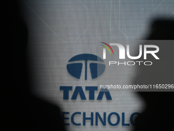 A Tata logo is seen during a press conference of a joint venture between Tata Technologies and BMW Group in Mumbai, India, on October 8, 202...