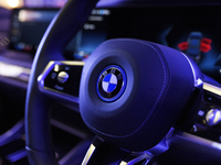 A BMW logo of the BMW i7 electric car is seen during a press conference of a joint venture between Tata Technologies and BMW Group in Mumbai...