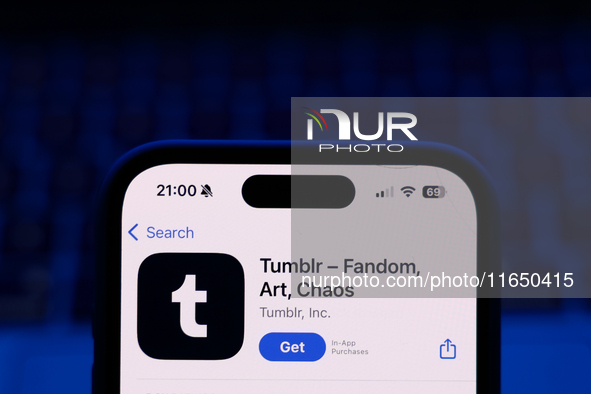 A laptop keyboard and Tmblr on App Store displayed on a phone screen are seen in this illustration photo taken in Poland on October 8, 2024....