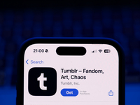 A laptop keyboard and Tmblr on App Store displayed on a phone screen are seen in this illustration photo taken in Poland on October 8, 2024....