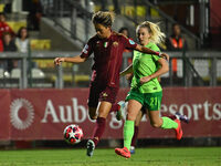 Moeka Minami of A.S. Roma Femminile and Rebecka Blomqvist of VfL Wolfsburg are in action during Group A - Day 1 of the UEFA Women's Champion...