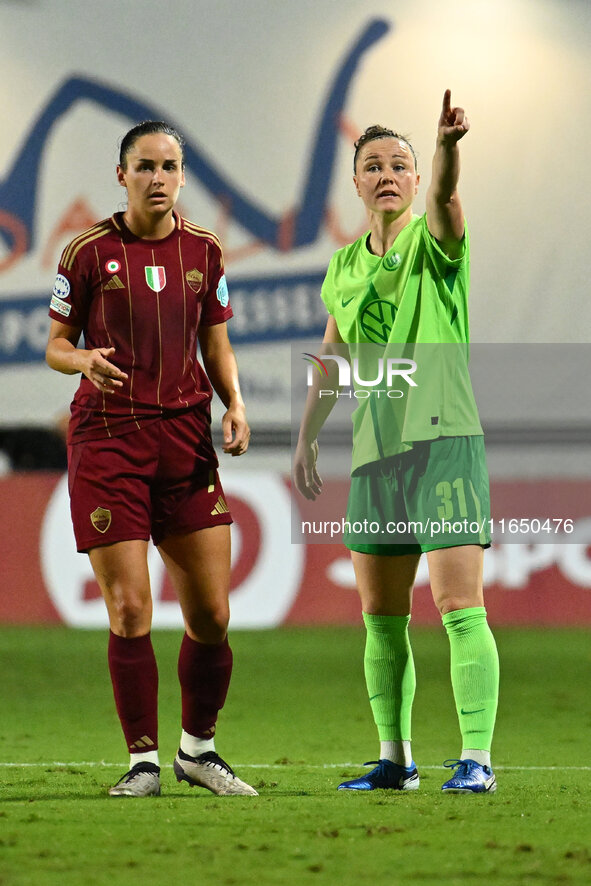 Evelyne Viens of A.S. Roma Femminile and Marina Hegering of VfL Wolfsburg participate in Group A - Day 1 of the UEFA Women's Champions Leagu...